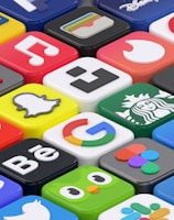 A collection of colorful 3D app icons arranged in a grid-like pattern, featuring well-known brands and services such as Spotify, Netflix, Discord, and Facebook. Each icon is distinct with vibrant colors and recognizable logos, giving a sense of modern digital culture.