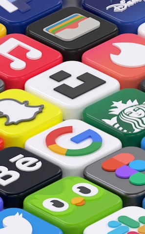 A collection of colorful 3D app icons arranged in a grid-like pattern, featuring well-known brands and services such as Spotify, Netflix, Discord, and Facebook. Each icon is distinct with vibrant colors and recognizable logos, giving a sense of modern digital culture.